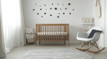 Interior of spacious nursery with wooden crib and empty chair by star wallpaper at contemporary white apartment