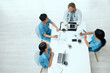 © KayExam/peopleimages.com - People, doctor and nurse in meeting at office with teamwork, collaboration and planning. Employees, above and coworking with strategy for healthcare, research and brainstorming as medical team