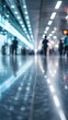 © Business Image - Modern airport terminal with blurred passengers and reflected lights for travel design