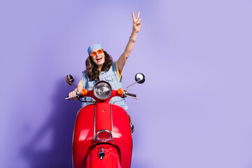 Sticker - Photo portrait of pretty retired woman ride motorbike show v-sign wear trendy denim hipster outfit isolated on violet color background