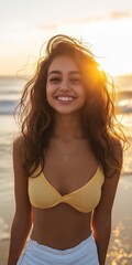 Sticker - A woman with long hair and a yellow bikini top is smiling at the camera