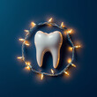 © CreativeLight - Close Up of a Shiny White Tooth Surrounded by a Glowing Christmas Garland, Dental Themed Holiday Image