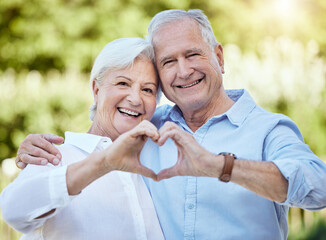 Canvas Print - Portrait, heart hands and happy senior couple outdoor for support, care or love emoji. Face, man and woman with sign for romance, loyalty and connection for relationship on valentines day in nature