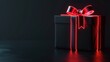 © Elen Nika - Black gift box with red neon glowing ribbon on black background
