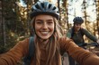 © Milos - Two friends riding bicycles along a forest trail, capturing a shared moment of joy and camaraderie amidst the beautiful natural surroundings.