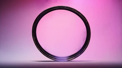 Wall Mural - A Black Circular Frame Against Pink And Purple Gradient Background