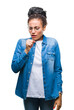 © Krakenimages.com - Young braided hair african american girl wearing glasses over isolated background feeling unwell and coughing as symptom for cold or bronchitis. Healthcare concept.