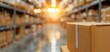 © DJSPIDA FOTO - A close-up of a cardboard box in a well-lit warehouse, showcasing an organized storage environment with boxes in the background.