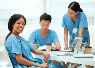 Wall Mural - Woman, medical student and happy with laptop on teamwork and collaboration for healthcare research. People, internship program and smile on portrait with statistics for group assignment at clinic