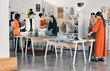 © CourtH/peopleimages.com - Teamwork, fashion designer or women in meeting for startup, trendy ideas or creative clothes. Staff, production stylist or people in design agency office for boutique, modern style or small business
