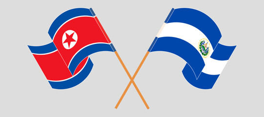 Crossed and waving flags of North Korea and Republic of El Salvador. Vector illustration