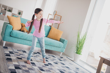 Canvas Print - Photo portrait of young funny kid little brunette girl staying at home love dancing alone party discotheque isolated in her room