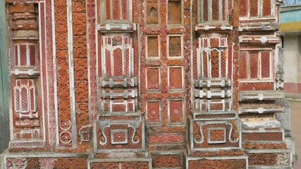 Wall Mural - Famous Antpur Radhagovindjiu temple with crafted wood and exquisite terracotta carvings depicting stories from all 18 puranas. Here Swami Vivekananda took monastic vows in 1886, West Bengal, India