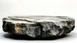 © Siasart - A flat, round stone slab with textured surfaces, resembling a natural table or display piece.