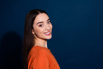 Canvas Print - Profile side photo of cheerful lovely cute woman wear orange trendy clothes isolated on dark blue color background