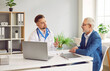© Studio Romantic - Serious male doctor or nurse is consulting an elderly senior male patient, sitting at a table in the hospital office. They are talking and providing care during the medical consultation.