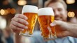 © K-MookPan - Two friends toasting with beer in a pub.