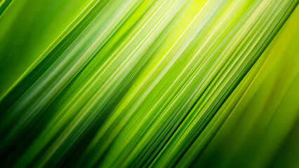 A close-up of vibrant green grass blades swaying in the breeze, creating an abstract background with dynamic lines and shapes. The sunlight highlights the texture and details on each blade.