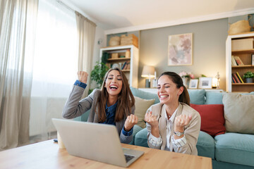 Wall Mural - Successful Businesswomen Enjoying a Triumph