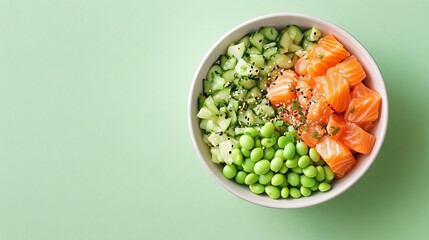 Poke bowl with vibrant salmon and edamame on a pastel green background, with minimal decoration to create a serene, uncluttered look