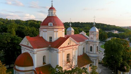 Wall Mural - Aerial view of the Church of St. Peter and St. Paul, located in Antakalnis district in Vilnius. Beautiful summer evening in the capital of Lithuania. Summer city scenery in Vilnius, Lithuania.