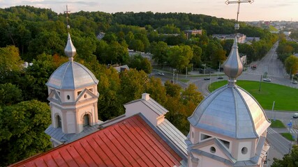 Wall Mural - Aerial view of the Church of St. Peter and St. Paul, located in Antakalnis district in Vilnius. Beautiful summer evening in the capital of Lithuania. Summer city scenery in Vilnius, Lithuania.