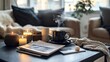 © chutikan - A coffee table in a cozy lounge area, with magazines, candles, and a steaming coffee cup