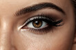 © Alex Vog - Close-up of female beauty eye with long eyelashes and black liner makeup, lovely shape make-up. Macro shot young woman eye visage, perfect cosmetic. Cosmetics spa salon concept. Copy ad text space
