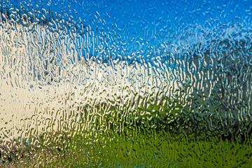 Abstract background taken through patterned glass