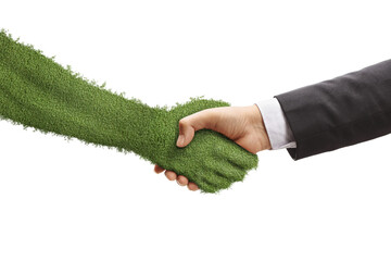 Poster - Businessman shaking hand with a green hand covered with grass, sustainability and ecology concept