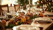 © NATTAWUT - The phrase Thanksgiving Day written in a calligraphic style over a background of a well-set wooden dinner table