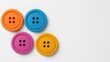© Narongsag - Colorful Plastic Buttons on White Background