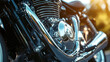 © Margarete - A close-up shot of a powerful sport motorcycles engine with chrome details shining under bright sunlight.