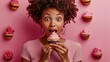 © Generative AI - Emotional surprised dark skinned woman eats cake and cupcake surrounded by tasty homemade desserts has unhealthy nutrition cannot believe something isolated on pink wall Junk food calo : Generative AI