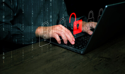 cybersecurity and safety concept. a padlock is unlocked or hacked on laptop computer keyboard. cyber