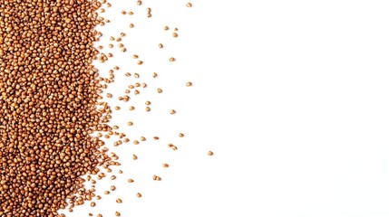 Close-up of brown seeds scattered on a white background, ideal for culinary, agricultural, or botanical themes.