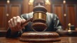 © Ka - The judge's hand holds the gavel, ready to bring it down on the altar in front of them. The scene is set in a courtroom with warm lighting