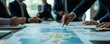 © ImagePulse - Business leaders passing around printed evacuation protocols and contingency diagrams during a meeting, evacuation strategy, business resilience