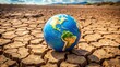 © prachaya - Globe earth on dry ground symbolizing drought and the importance of environmental protection, globe, earth, dry