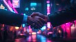 © ShinneProject - Two businessmen shake hands in front of a blurry background of a city street at night with neon lights.