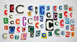 © Elena - The letter C. set of letters cut out of paper magazines and newspapers in different sizes and fonts. white background.