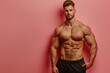 © kitipol - Cropped view of a smart, muscular man confidently presenting, showcasing his fit physique against a solid color background, emphasizing strength and professionalism