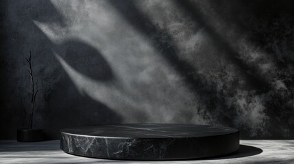 Wall Mural - a minimalist dark marble platform with dramatic shadows against a textured wall.