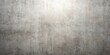 © Prasert - Brushed concrete background with light texture at eye level
