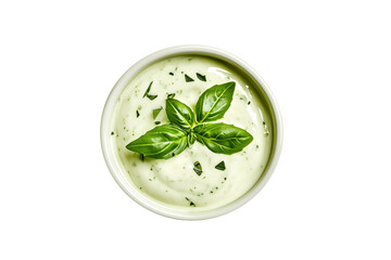 Bowl with creamy Ranch sauce garnished with fresh herbs and chopped green onions isolated on a white transparent background. Concept of fresh and healthy food