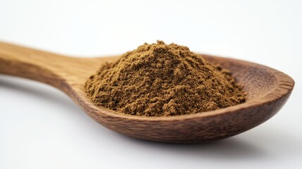 A wooden spoon filled with hojicha powder resting on a white background, showcasing its unique light brown tones