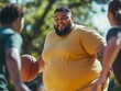 © Sasint - A plus-sized man playing basketball with friends, full of energy and enjoying the game