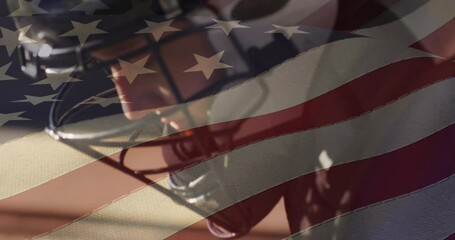 Sticker - American flag animation over close-up of person wearing glasses