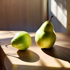 The image shows two green pears resting on a wooden table. The pears are illuminated by sunlight streaming through a window, casting long shadows on the table. The pear on the right is slightly larger