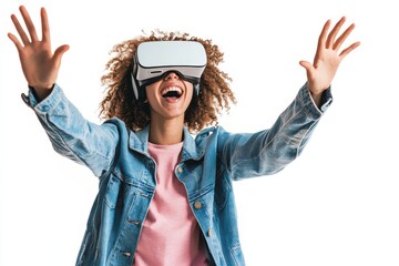 A smiling positive woman wearing virtual reality goggles wearing a VR headset uses the VR box to try to touch objects in virtual reality. Studio shot on gray background.